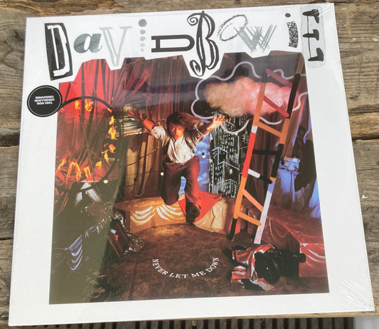 The front of 'David Bowie - Never Let me Down' on vinyl