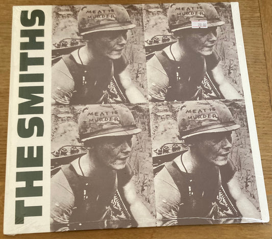 The front of 'The Smiths - Meat is Murder' on vinyl
